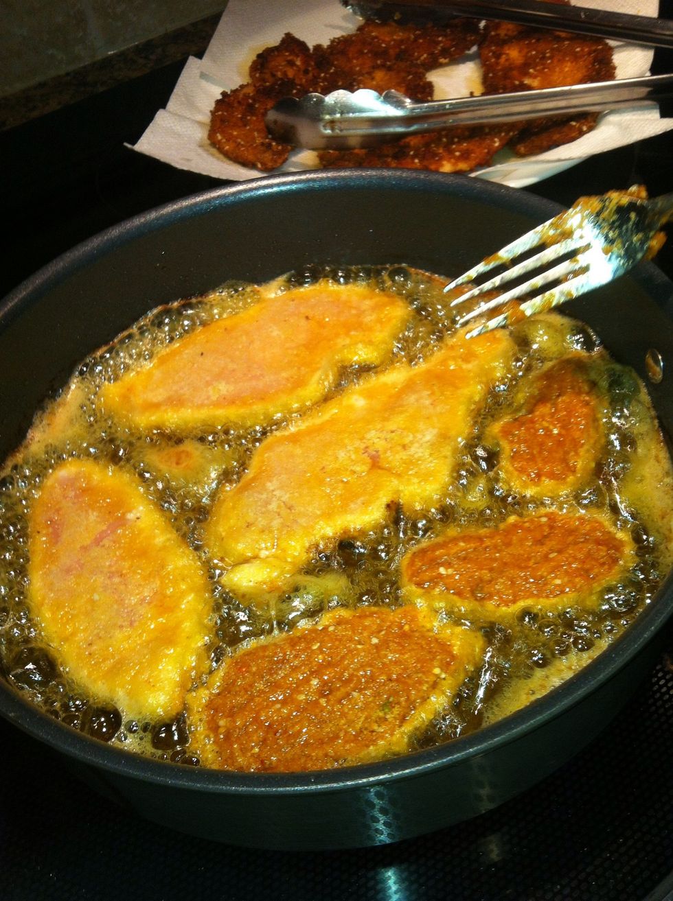 This is the second batch. The three lighter colored pieces are the almond crusted chicken. The darker three are the wet and dry mixture.