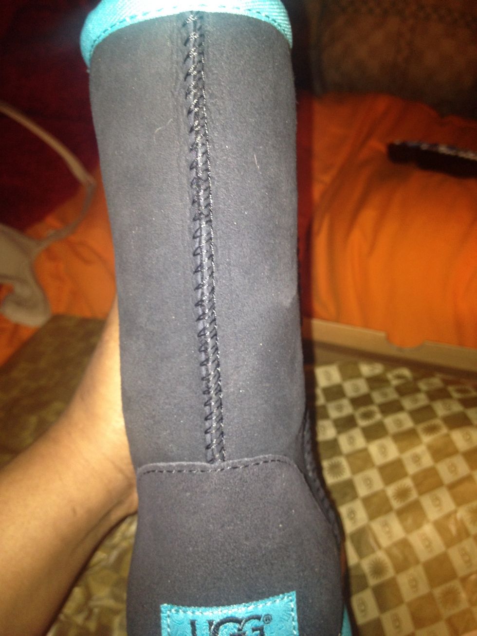 This is the stitching. Notice it's even. Yes, I know there are other UGG type of shoes, like bearpaw(I love bearpaw). But I also know that some folks think they can get UGGS for $30, you can't.