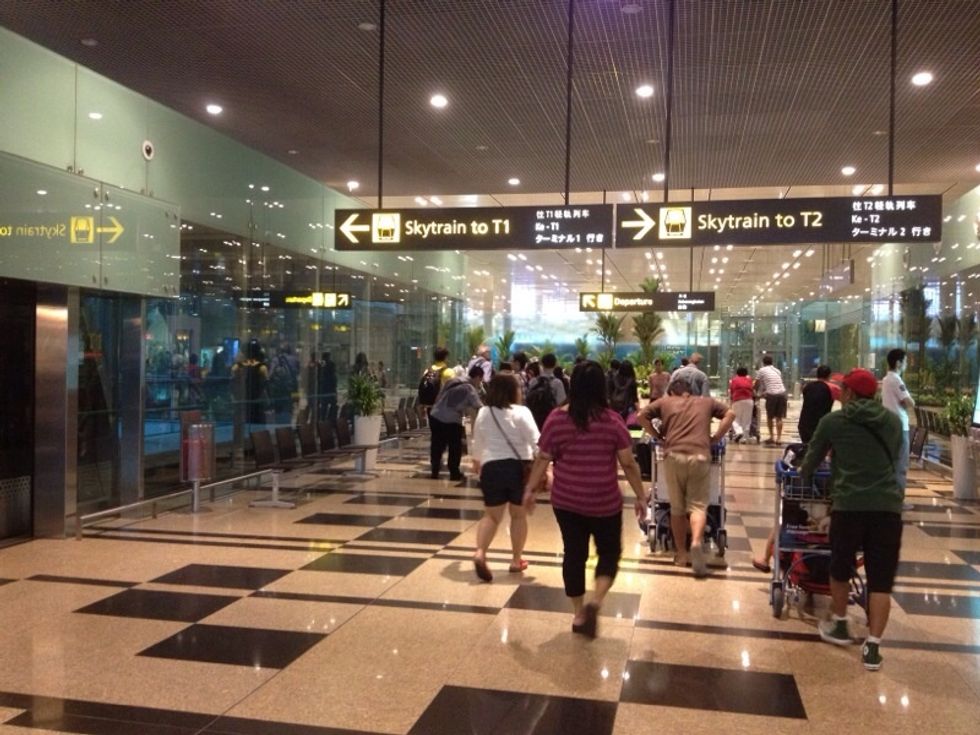 This is the surrounding when you get off the Sky Train at Terminal 3. Don't be mislead by the signs "Sky Train to T1 or T2". They are meant for people waiting to board the train. We are already at T3