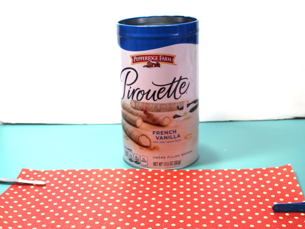 This is the tin that I started with.  I'm using Graphic 45's new DIY craft paper for this project.  Its the perfect weight and size for doing these kind of projects.