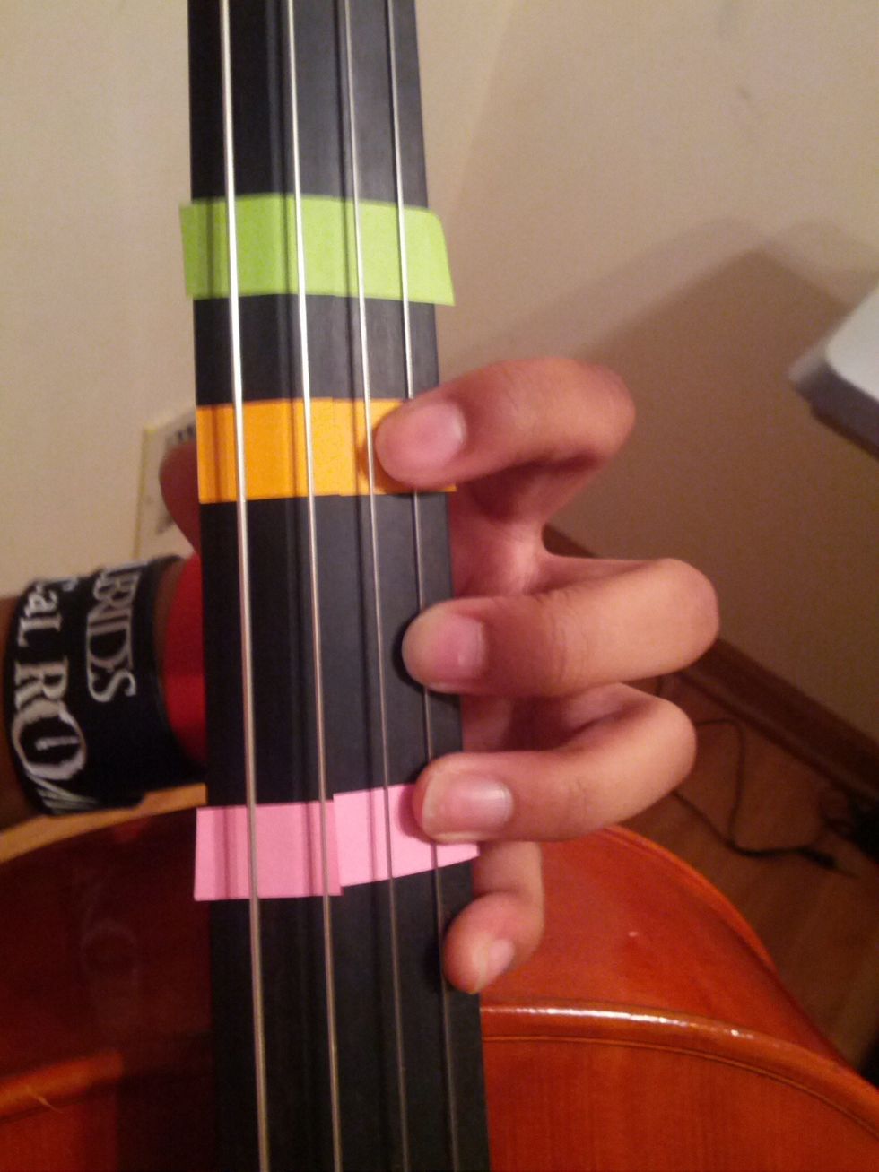 This is third position. Where your fourth finger usually is during first position, is where your first finger will now be.