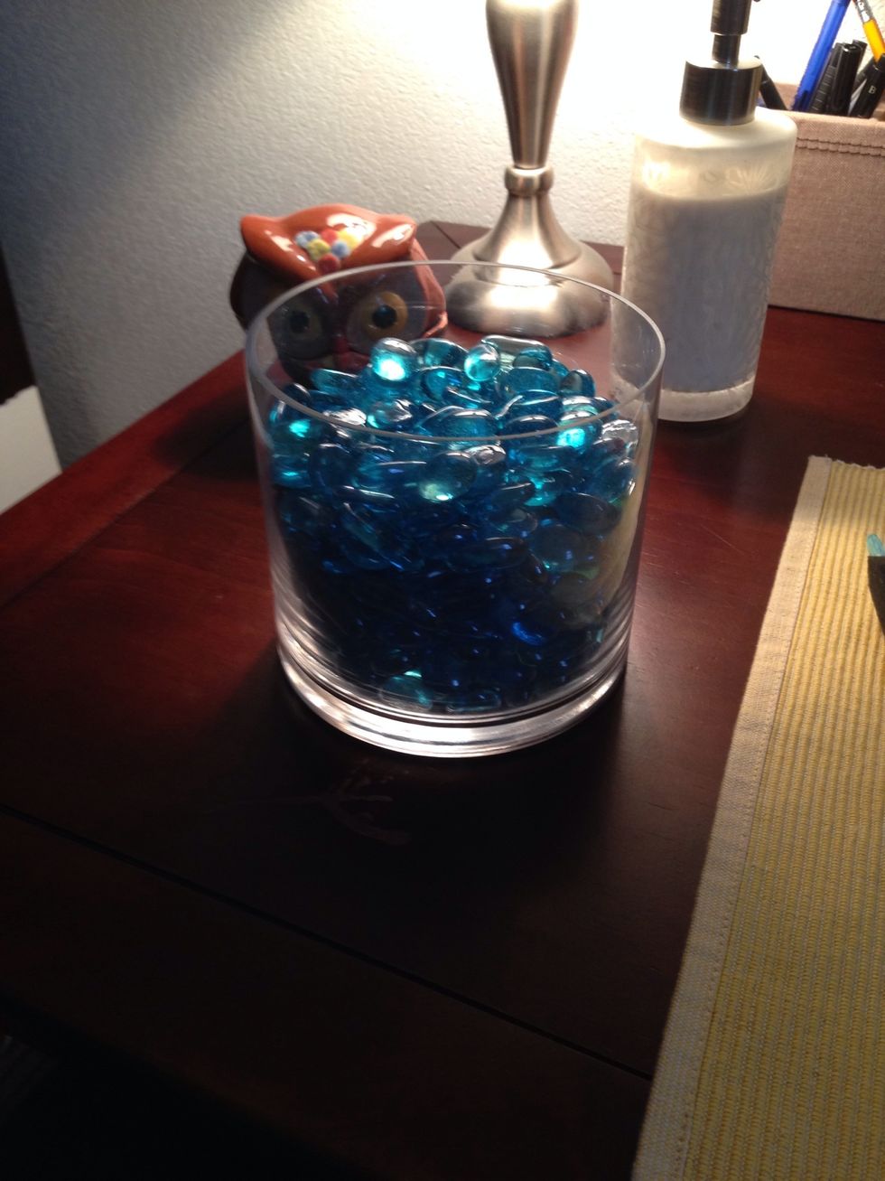 This is three Dollar Store bags worth of blue glass beads.