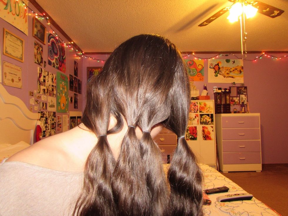 This is (to me) the hardest braid. Split your hair into four equal sections. I tied them off so they would be easier to see.