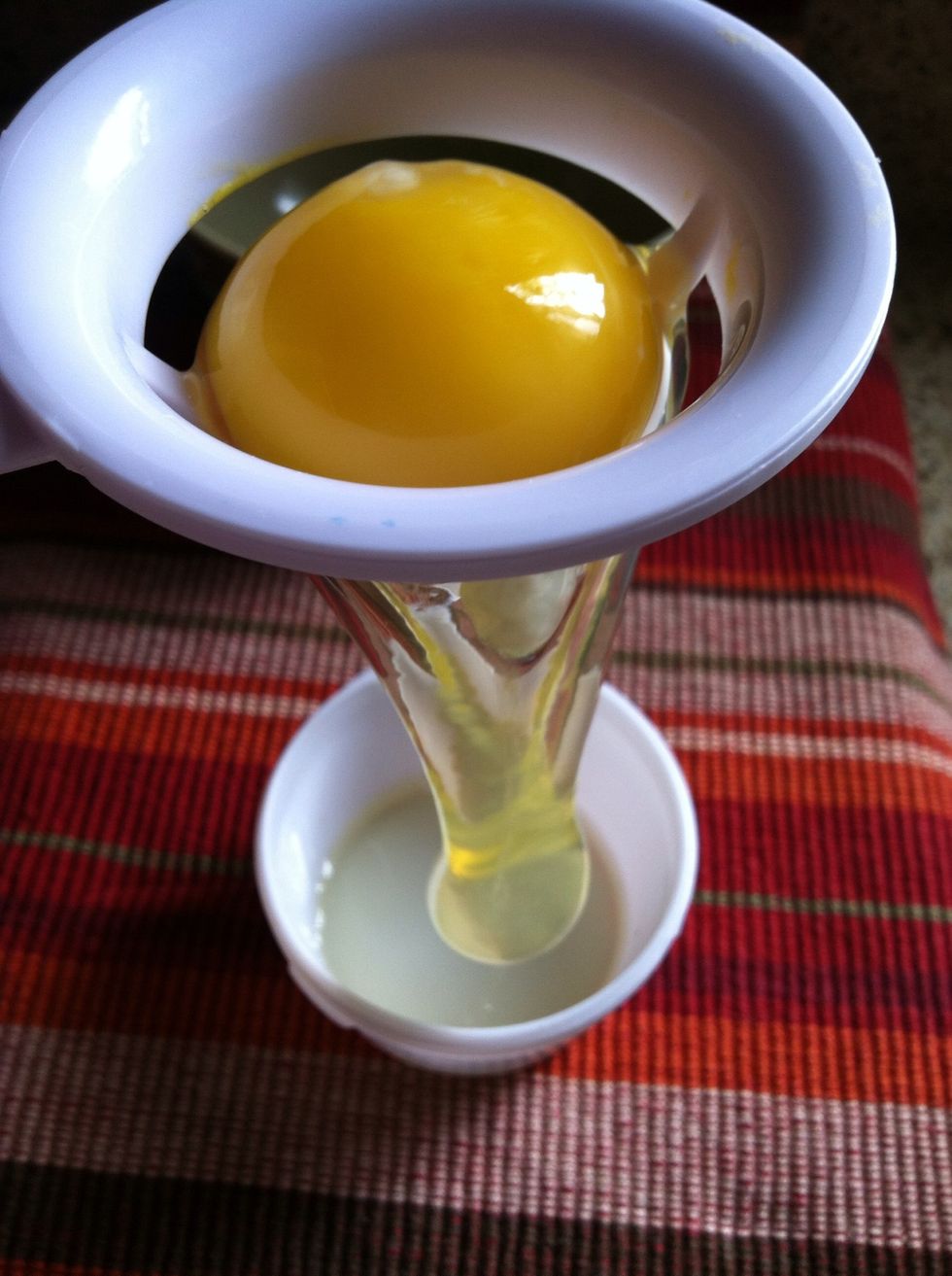 This is what happens if your egg is cold. A bit hard to separate. So try putting your egg out and let it cool to room temperature.