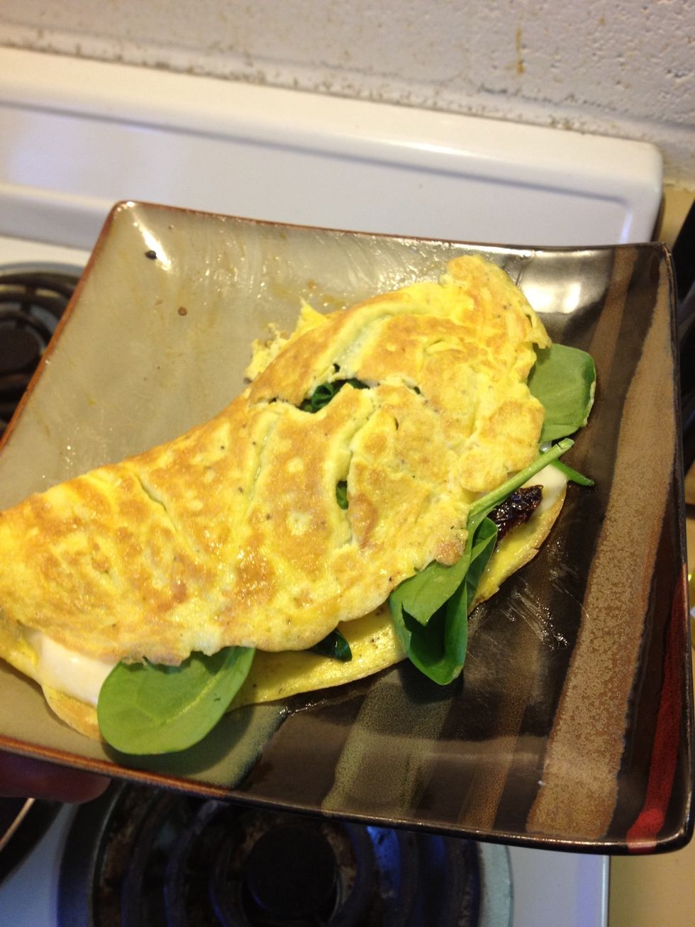 This is what it should look like at the end. I added a bit more spinach before folding because I love spinach, but that's completely optional. Enjoy!