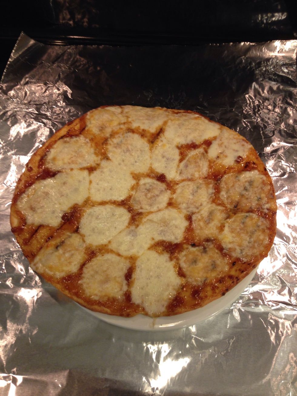 This is what it should look like when done. Lay pizza out over foil