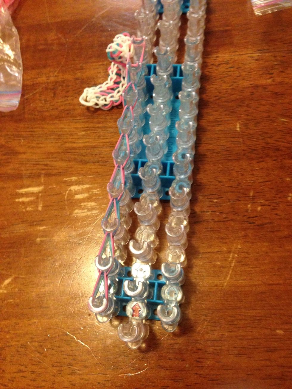 This is what it will look like. Take a c/s clip and put it on the loose band(s) at the bottom and clip it too the other side of the bracelet.