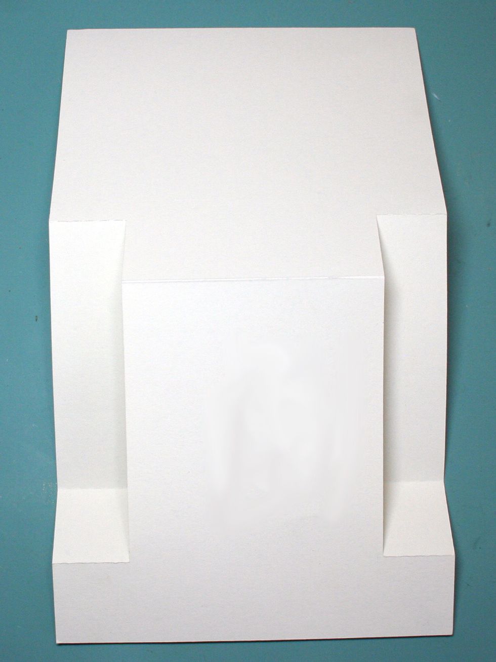 This is what the card should look like after you have cut it out and made the appropriate folds.