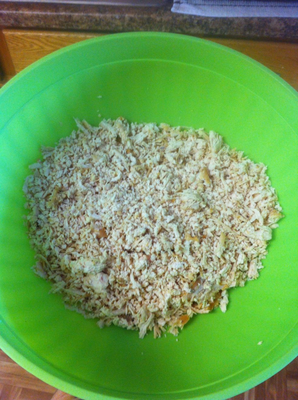 This is what the chicken should look like after it's shredded.