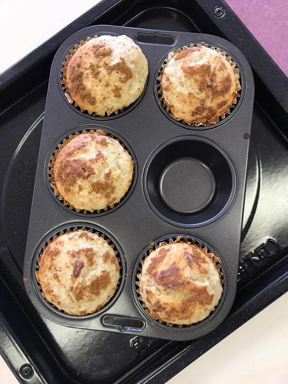 This is what the cinnamon cupcakes should look like after 18 minutes and to make sure its cooked fully insert a toothpick and if it comes out clean it is done