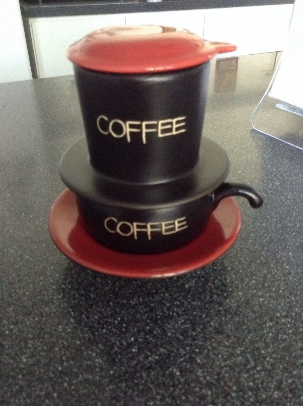 This is what the clay version looks like. The press itself is the top part while bottom part is just the cup.