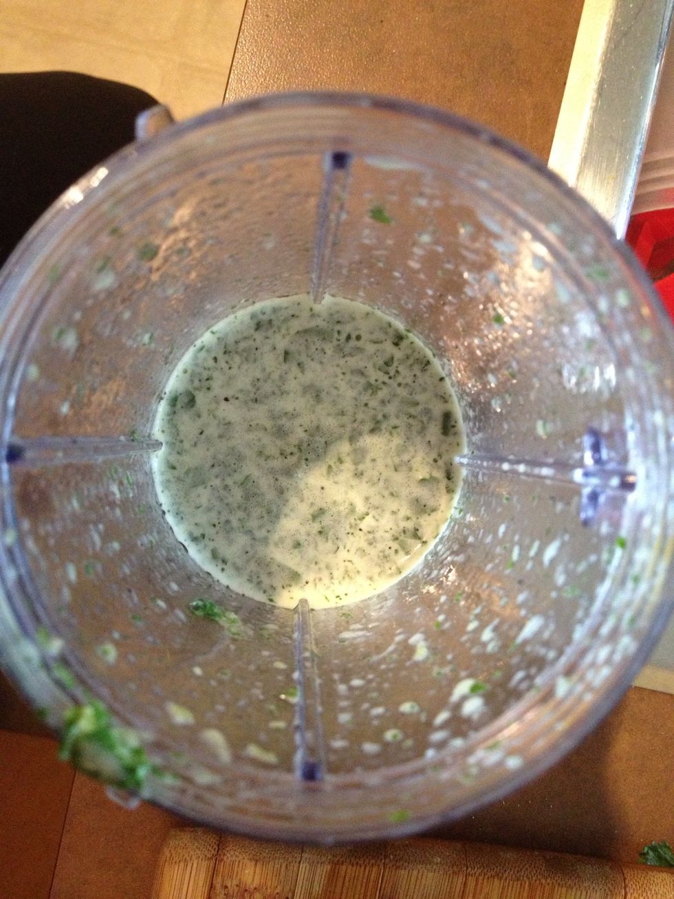 This is what the dressing should look like once it is done. The cilantro may not have completely blended but that is fine... Also if you taste it, it should taste very acidic and spicy.
