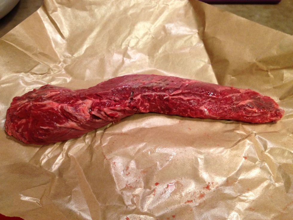 This is what the hanger steak looks like. If you use flank steak, you'll want to cut it in half lengthwise. Then, cut your meat into 1/4 inch strips of 2-3 inches in length, cutting against the grain.