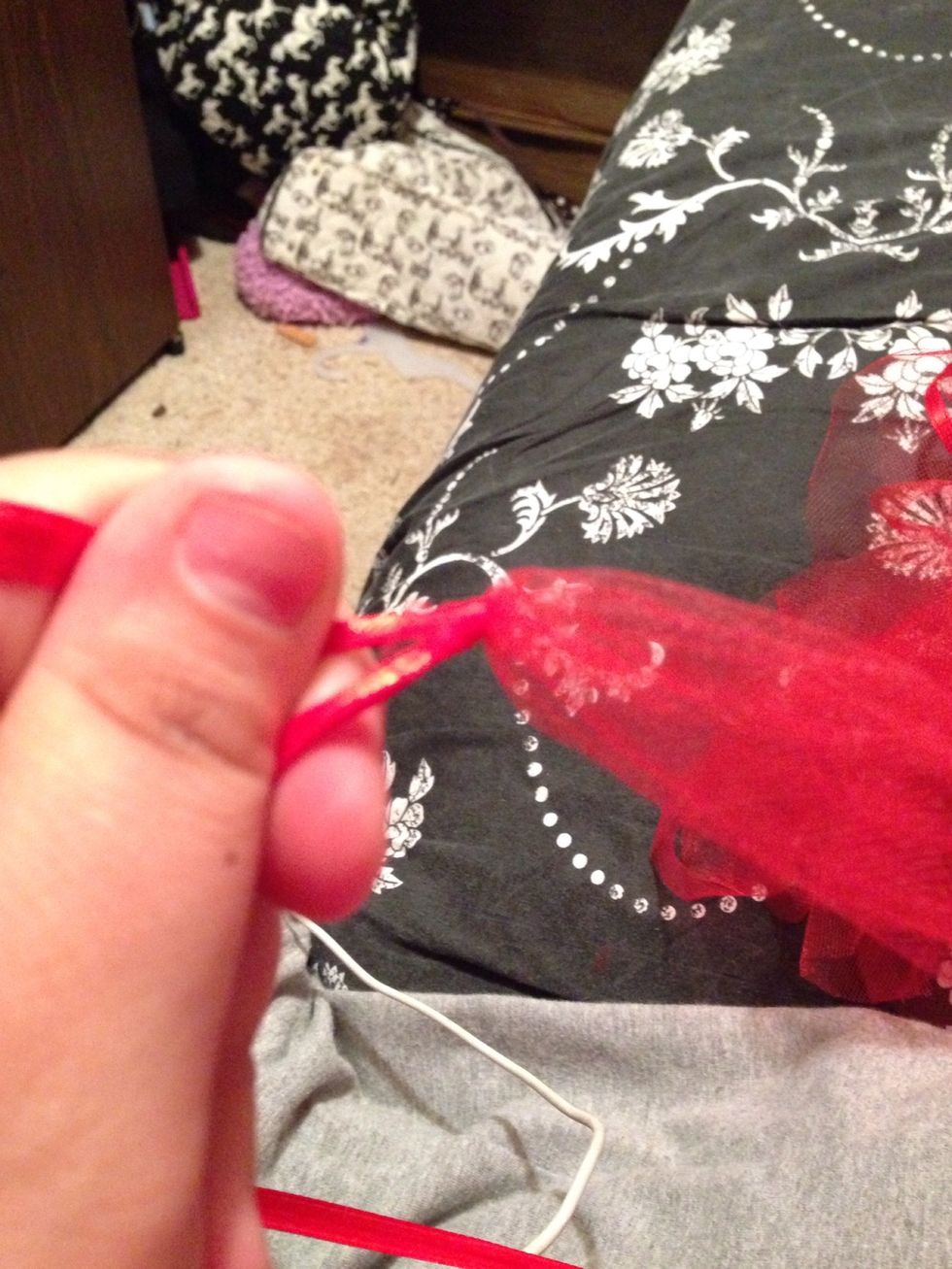 This is what the knot should look like. If it pulled the ribbon in a v shape easy fix just take ribbon and pull on sides stretching making it even