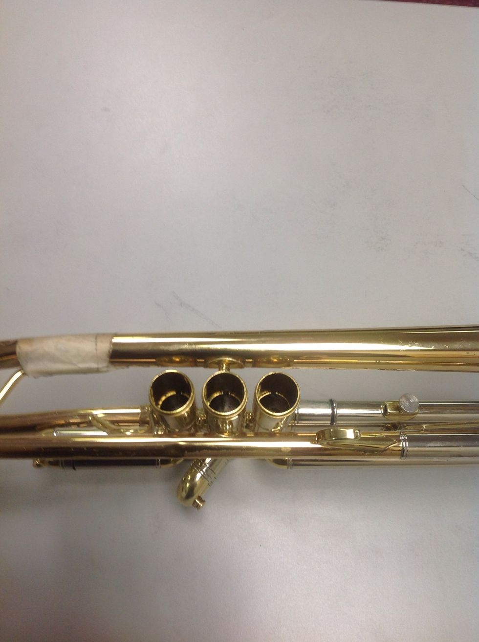 This is what the your trumpet should look like with all valves removed.