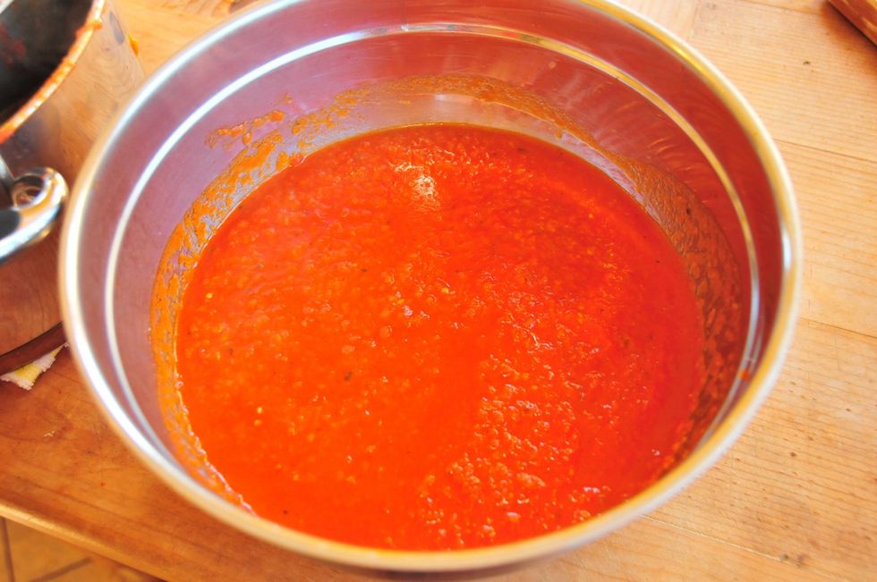 This is what your sauce will look like after the first run through the food mill. Cook the sauce down for another 15-20 minutes to thicken it up perfectly.