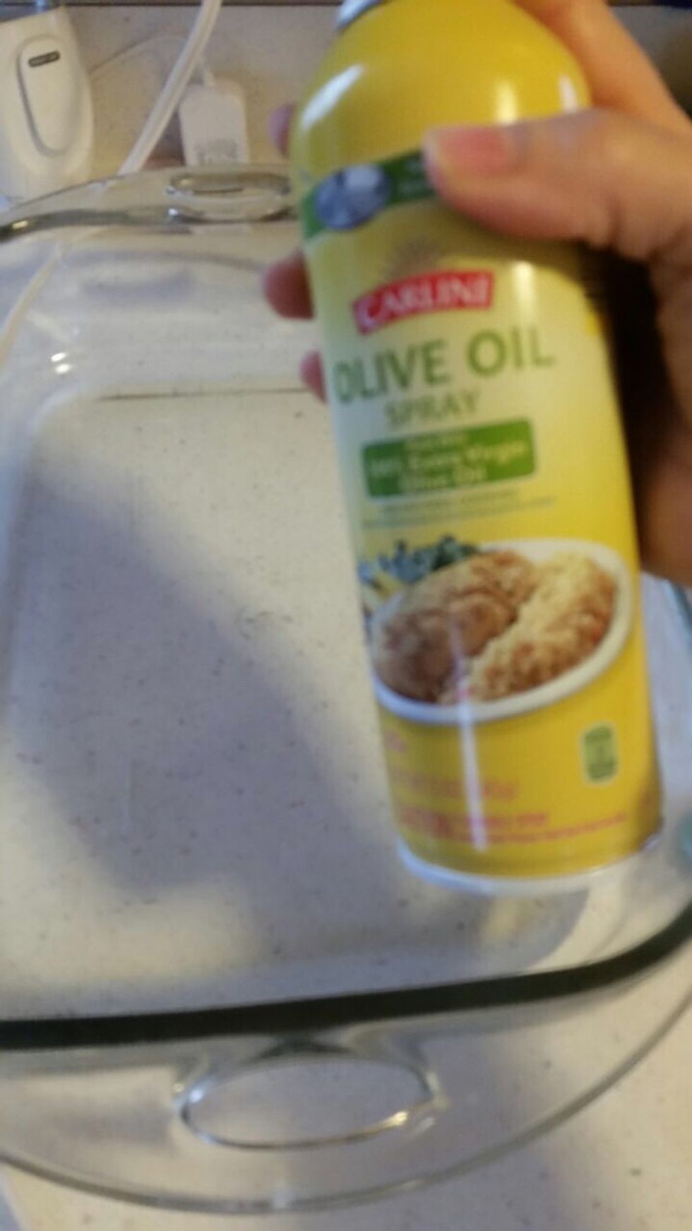 This is when you'll want to grab a pan to bake your cake in, spray Pam all around the pan