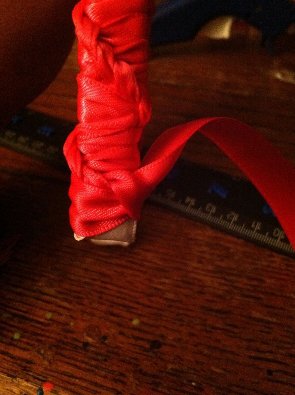 This is where I had to switch to pink because I didn't have enough white. Lucky I didn't glue it down as I went! Lol. For the end, make your final stitch a bit loose.