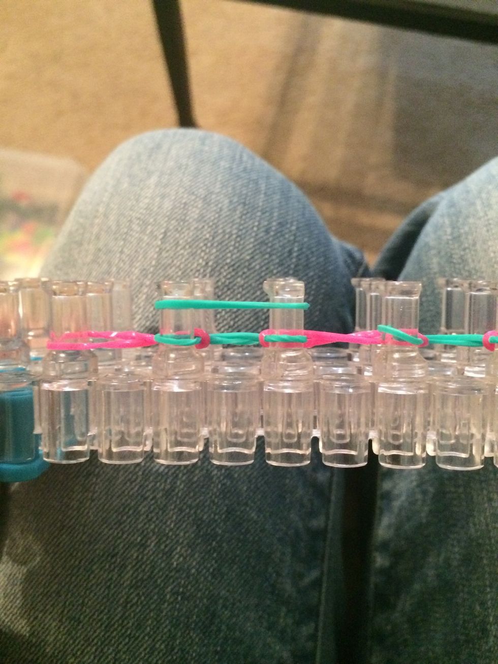This is where this bracelet differs from the regular dragon scale. Place 2nd row of blue rubber bands.