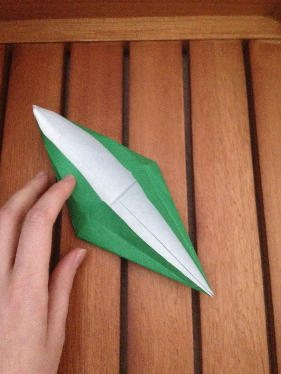 This is where your previous folds come in handy. You need to fold it back on itself.