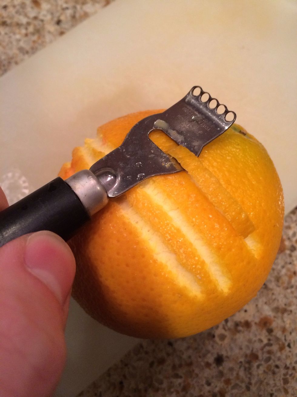 This is where your zestin' skills come into action. Peel off a nice long strip of orange peel\u2026