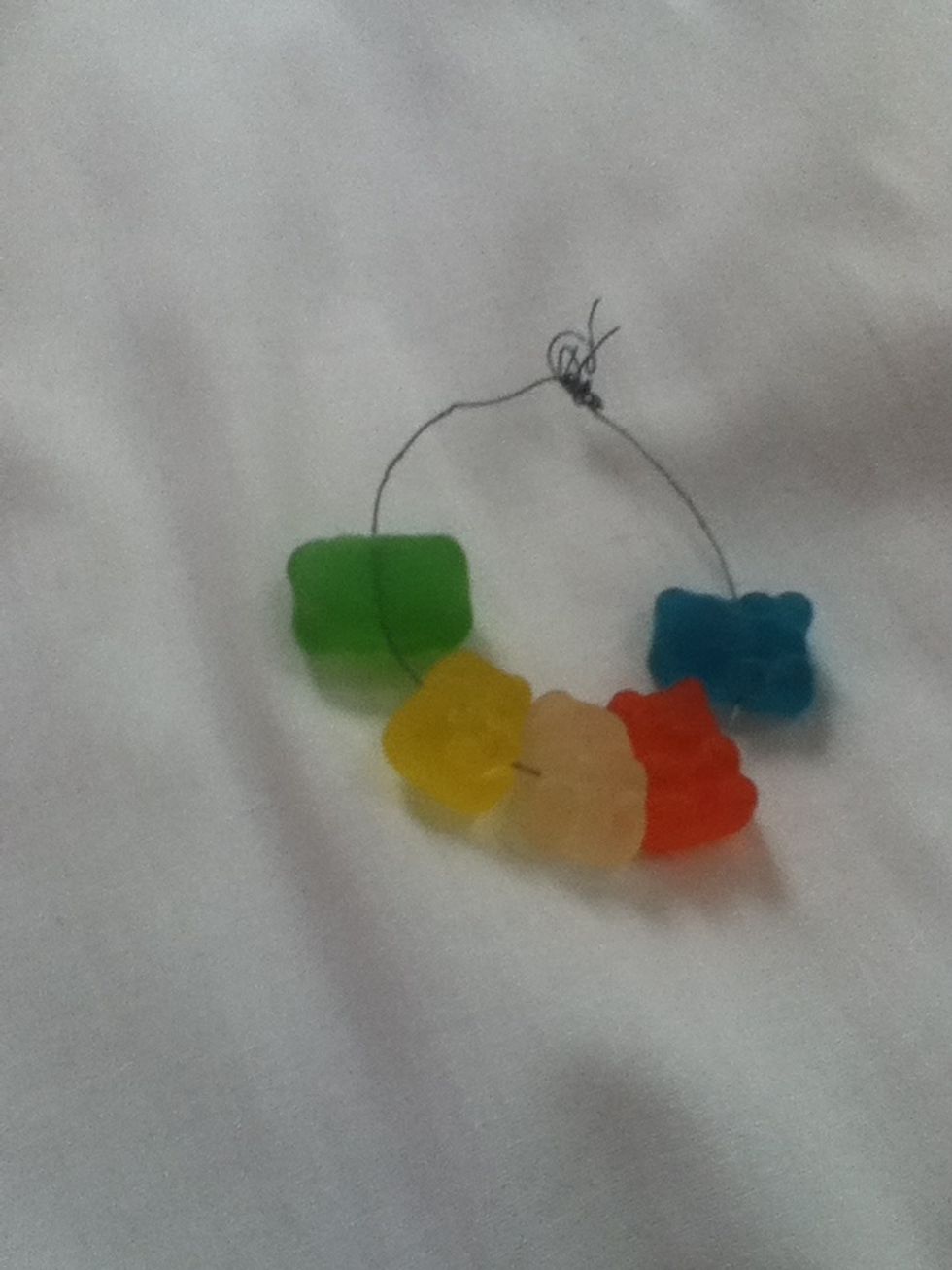 This is your completed bracelet! You should add more bears than this,but I got hungry and ate some!(:LOL