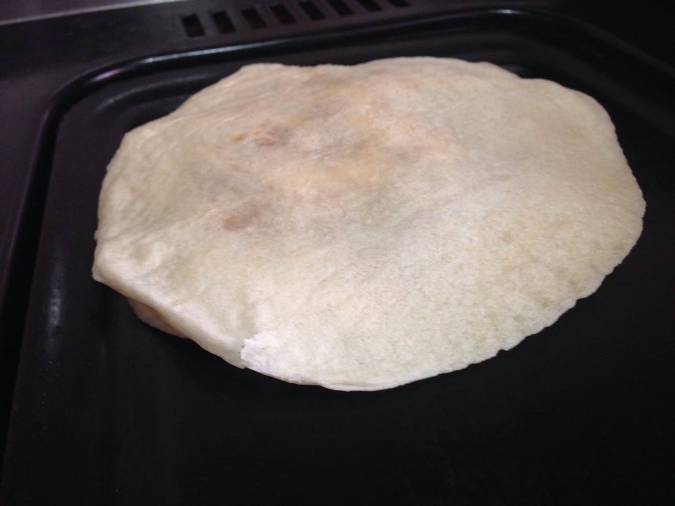 This looks like a quesadilla with 2 tortillas (like a sandwich) put it on a hot pan till you get a nice golden- brown color on both sides