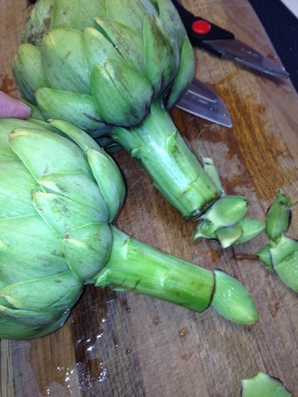 This makes it easier to hold by the stems while trimming the stickers from the leaves. Stems can also be left on and enjoyed as an extension of the heart.
