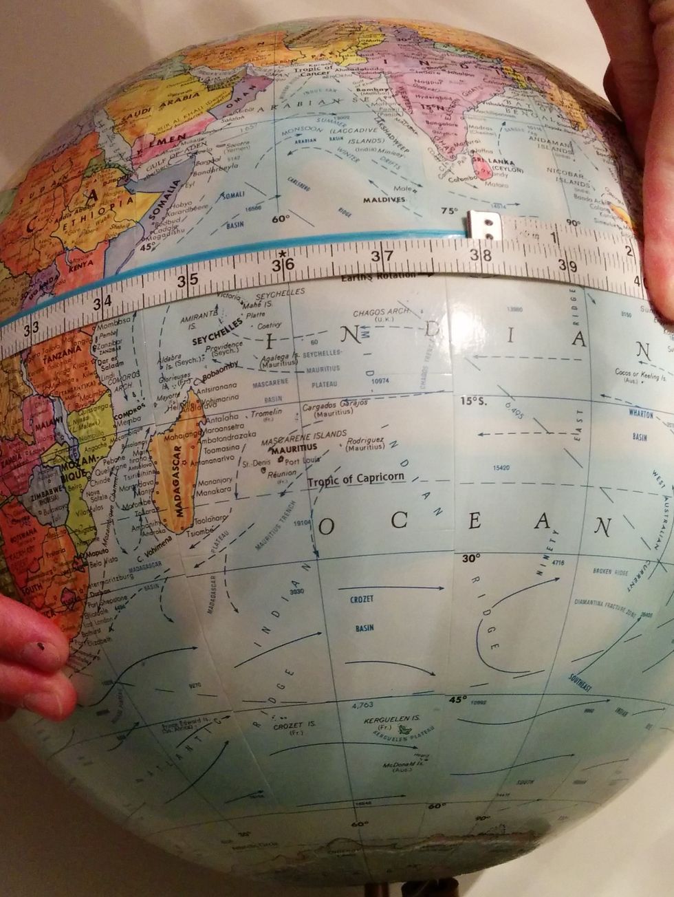 This measurement of the distance around the globe gives you an estimate of the circumference of the globe. This circumference will be used to calculate the diameter of the globe.