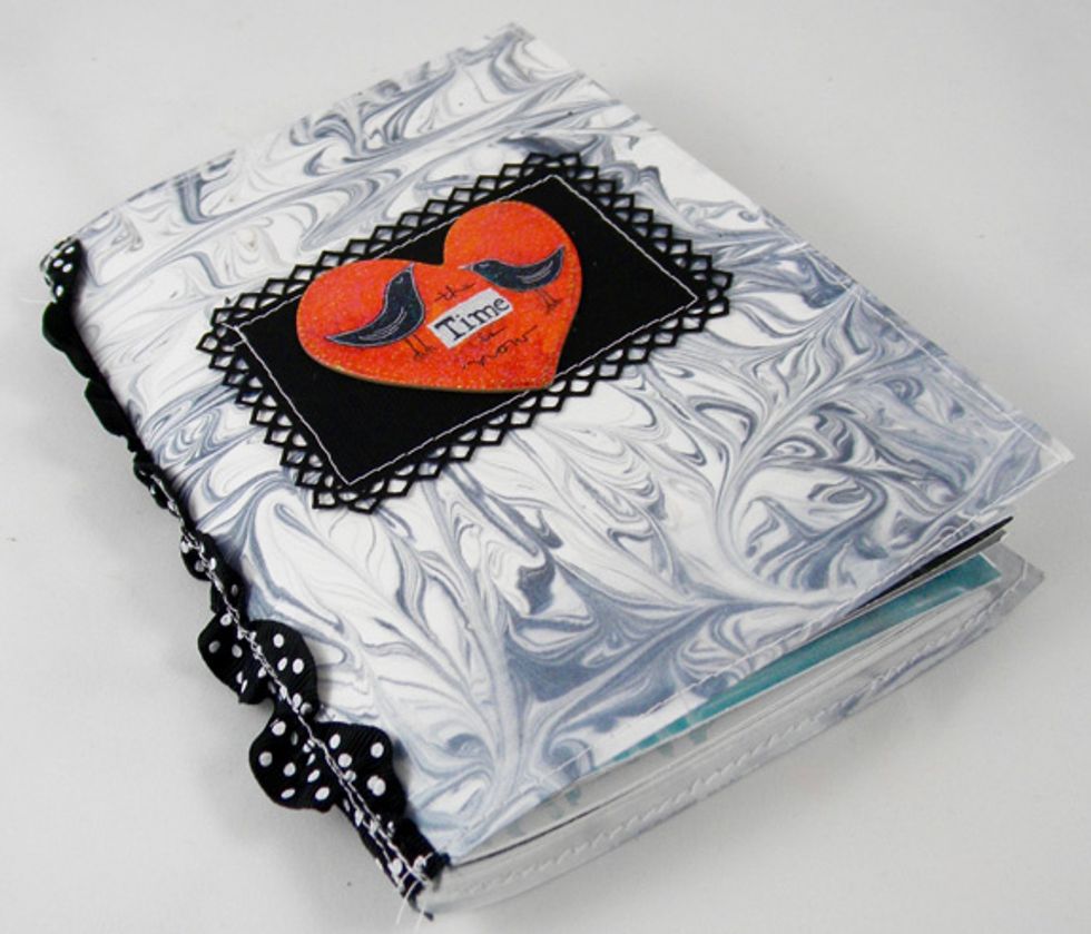 This one has neutral black, white and gray with some aqua for contrast.  I love how whimsical the cover turned out.