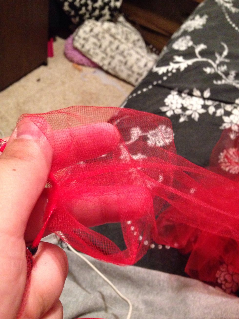 This one is hard to see but this is me pulling the two strips through the loop.. Sorry for the messy room..