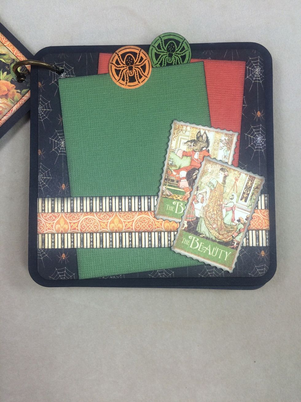 This page has a band to hold a few photo mats.