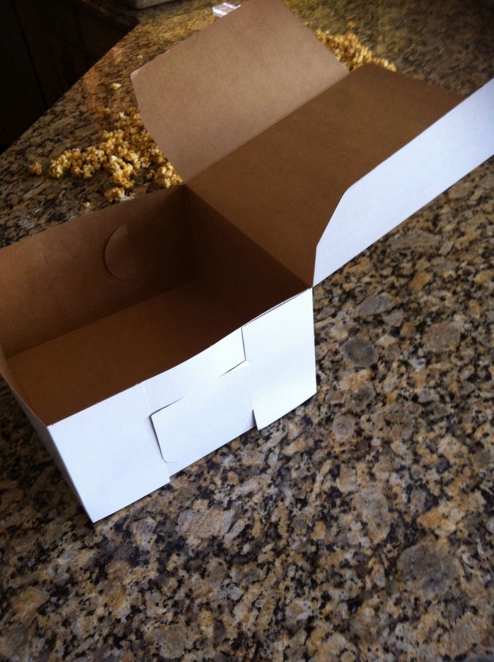 This part is just a suggestion :) this caramel corn is such a great gift idea. I used to make a ton at Christmas and give as presents. Take a large bakery box found in craft stores