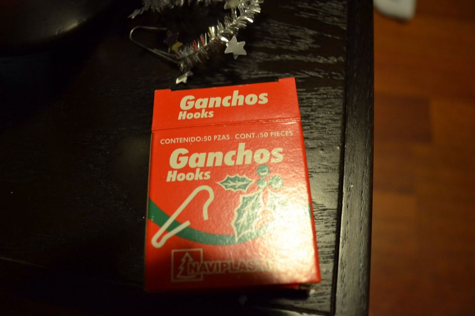 This part is optional: with hooks for Christmas trees hang the decoration!