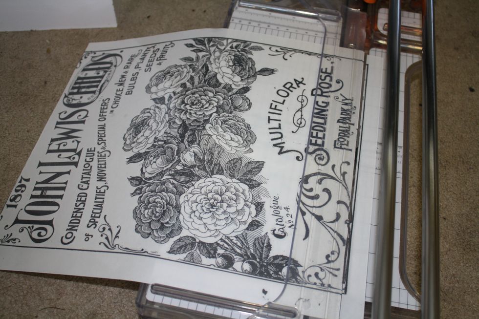 This particular Transfer had lines around it, since it is going on the door to this unit that is smaller than the decor transfer, I am simply trimming those lines off. Easy peezy!