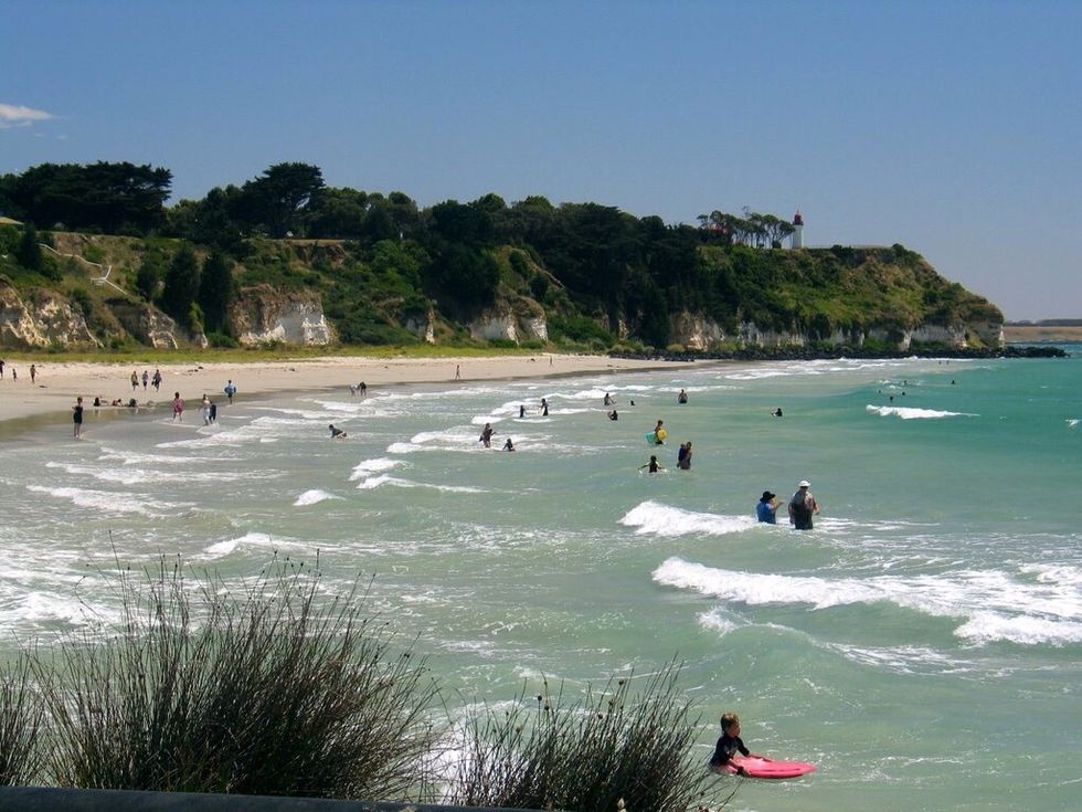 This photo is people having fun at the beach.