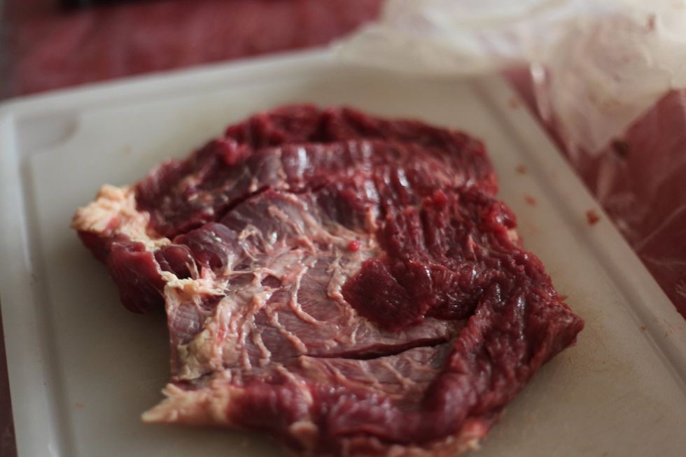 This piece of beef is from below the chest and is extremely fatty. Commonly known as chuck steak. However we took as much fat out as possible prior. Ask your butcher.