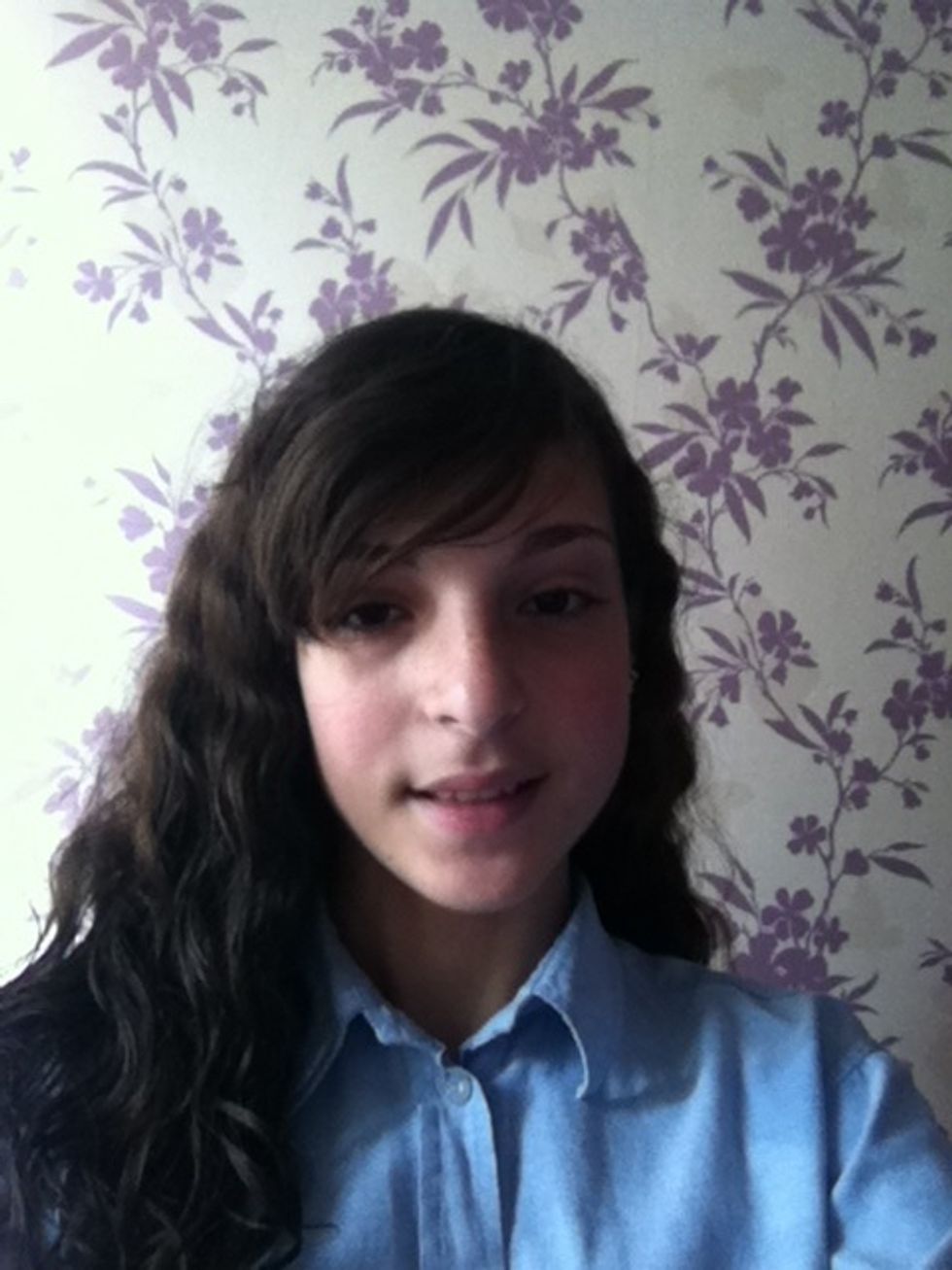 This plait works with straight or curly hair. Start with your hair clean and brushed