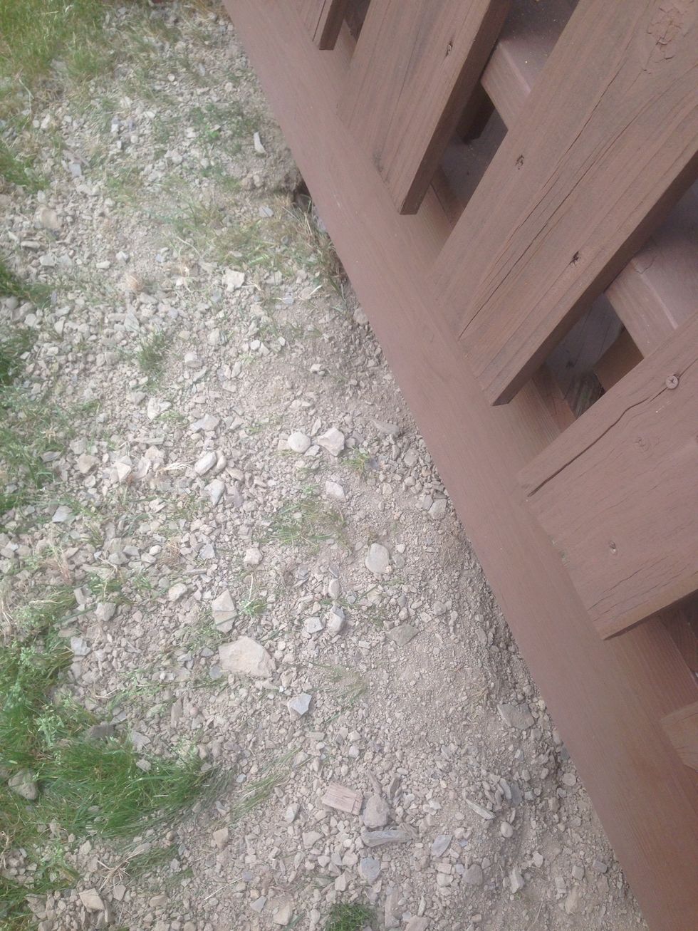 This porch blocks sediment from eroding and covering the back of the house.