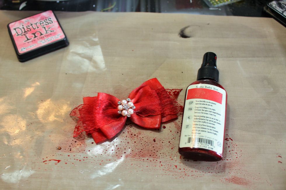 This pretty bow was in the main kit but I spritzed it with Glimmer Mist in Santa Baby so it would match my color scheme.