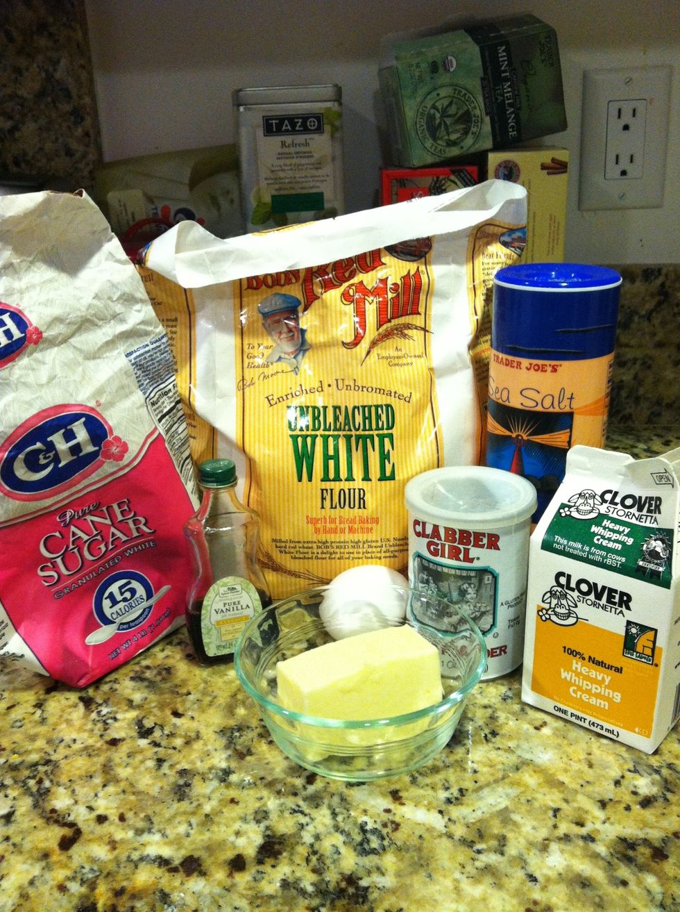 This recipe is based on the cream scone recipe from the Joy of Baking. Ingredients: Sugar, flour, salt, vanilla extract, egg, butter, cream, baking powder.