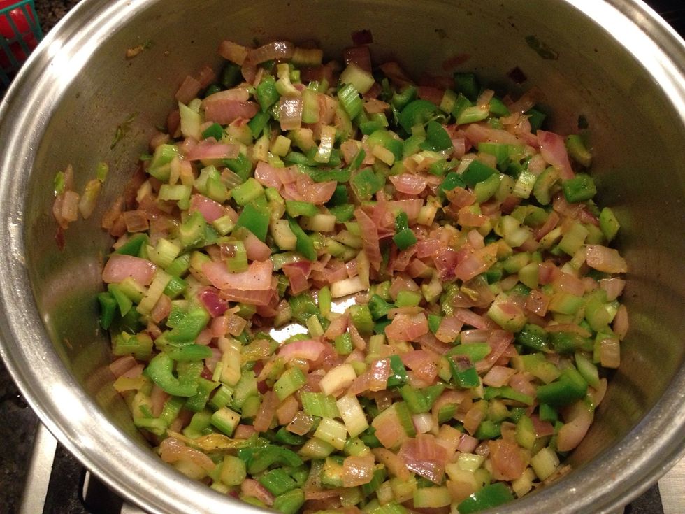 This recipe starts with the trinity of creole cooking: onions, celery, and bell pepper saut\u00e9ed in olive oil or vegetable oil.