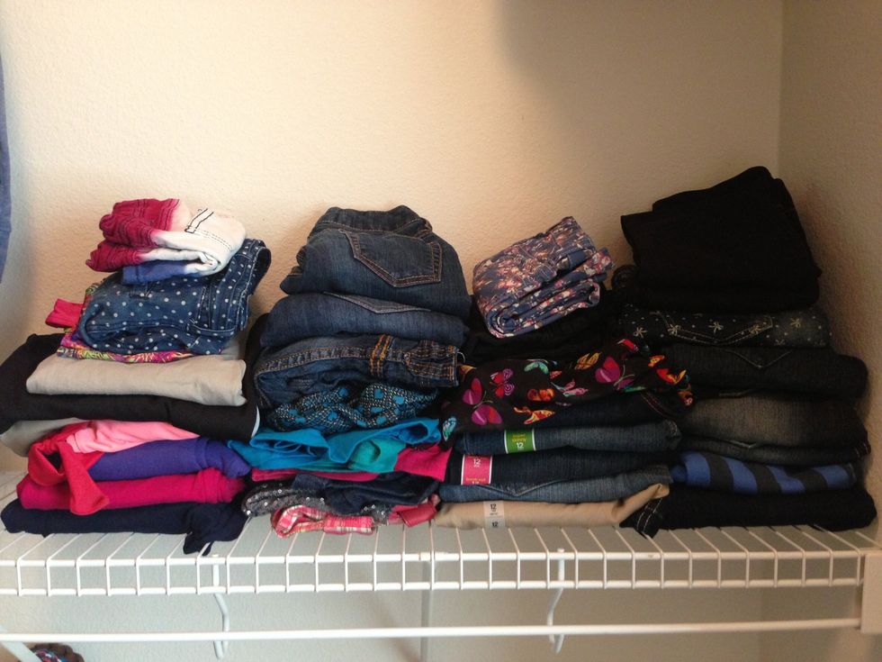 This right here is about 9 shorts, 17 pairs of pants, 5 skirts, 5 capris, 2 swimsuits, and 1 leotard.  All this space was stacked high and wide just from my pants.