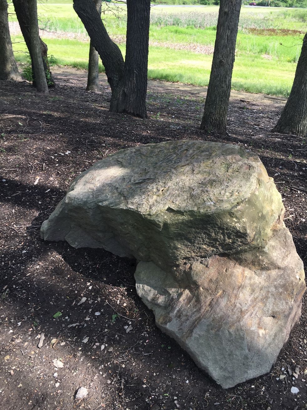 This rock was weathered down because of rain.