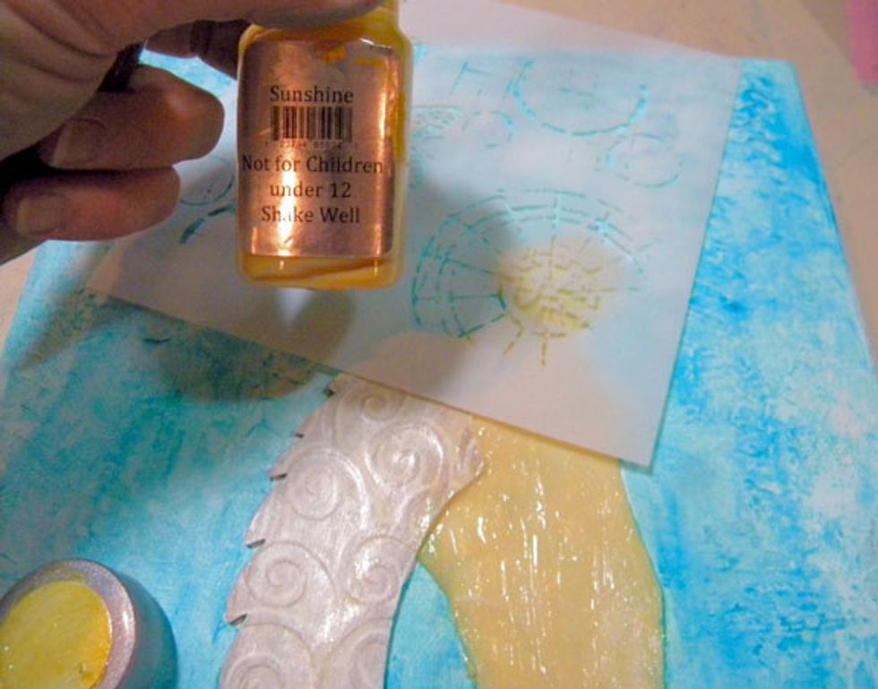 This semi-circle stencil I have makes the perfect halo, so I added Sunshine Sorbet through it. There are lots of ways to add a halo effect. I looked at angel art on Pinterest for ideas.