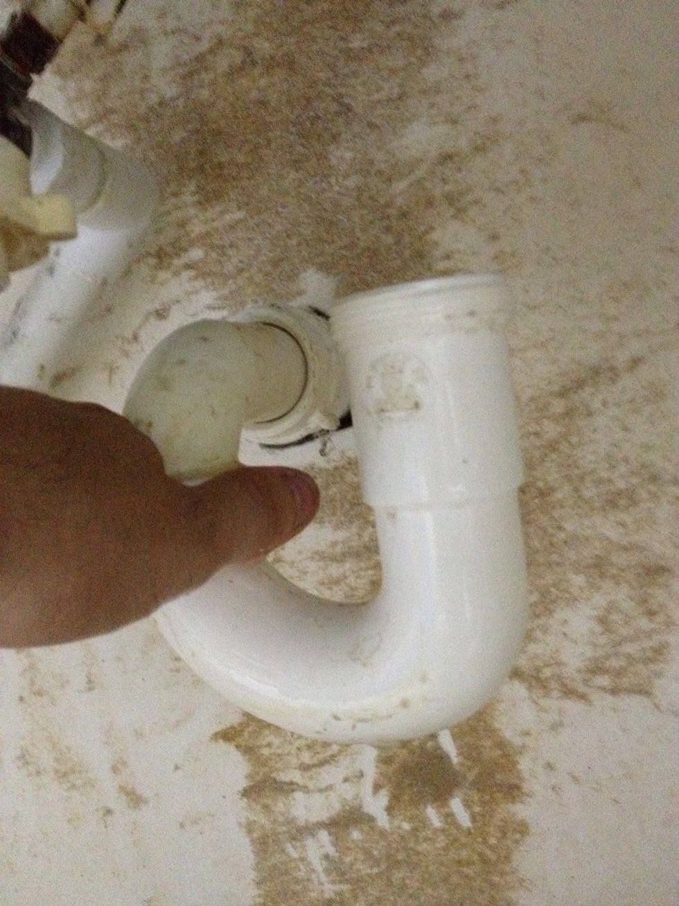 This should loosen the threads of the fastener up enough to unscrew it the rest of the way by hand.