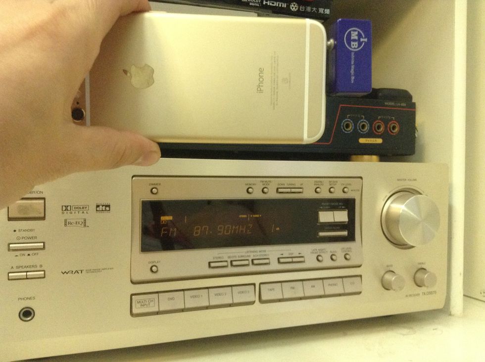 This simple inexpensive gadget provides an easy hook up to connect iPhone 6 to any home surround sound system.