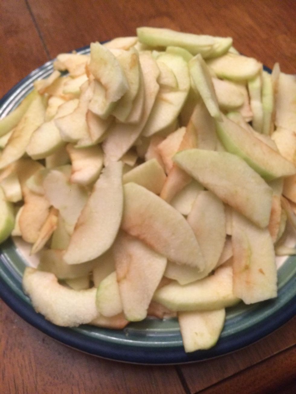 This step is optional, however I think it tastes better in the end. Using a paring knife still, peel all of the skin off of the apples. You can also do this before slicing the apples if you prefer.