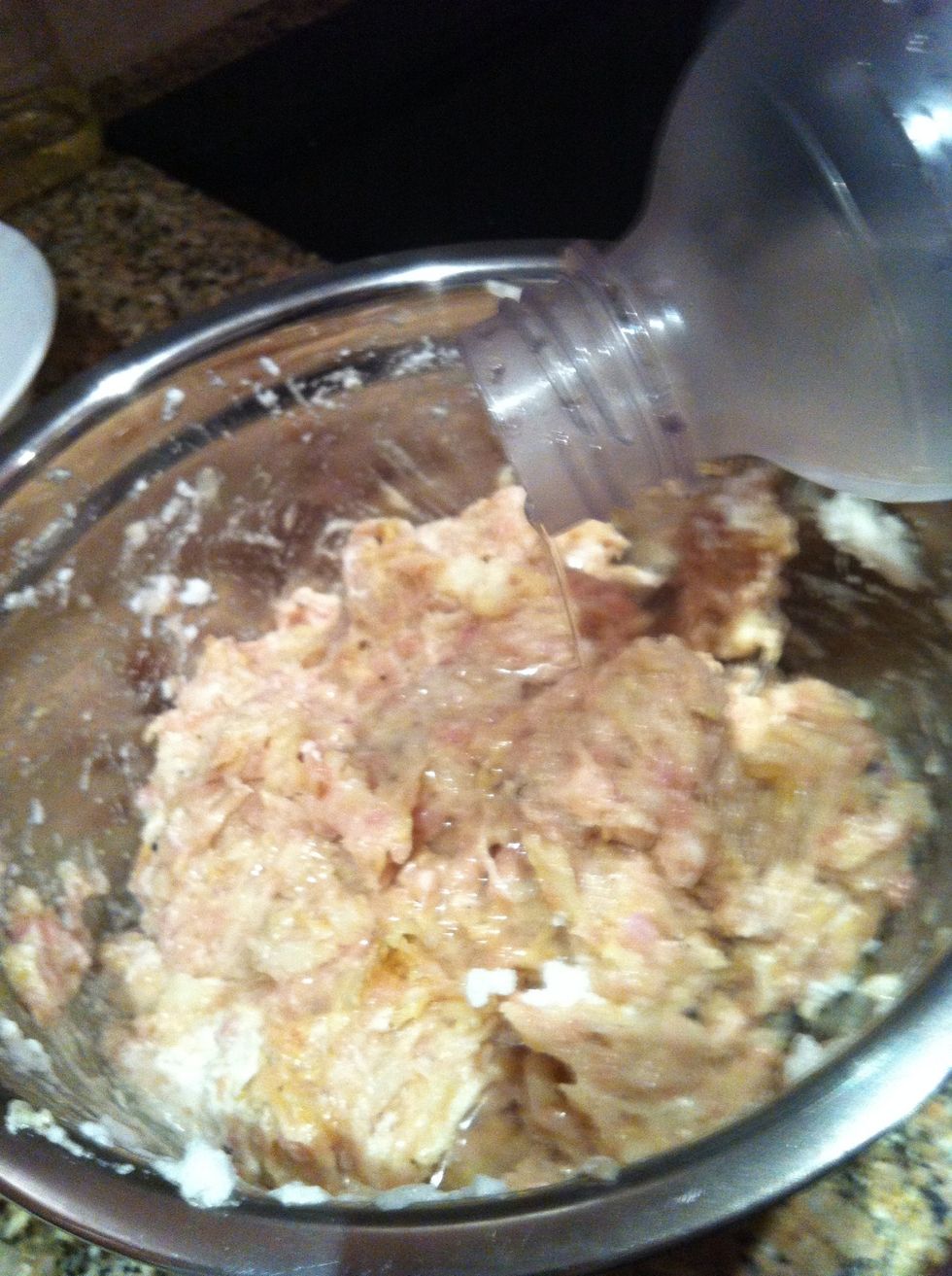 This step was not in grandma's recipe, but I use it with my own chicken and veal cutlet recipe...  so I figured it cannot hurt.  Add about 1/4 cup of soda (Perrier, San Pellegrino, soda-stream etc...)
