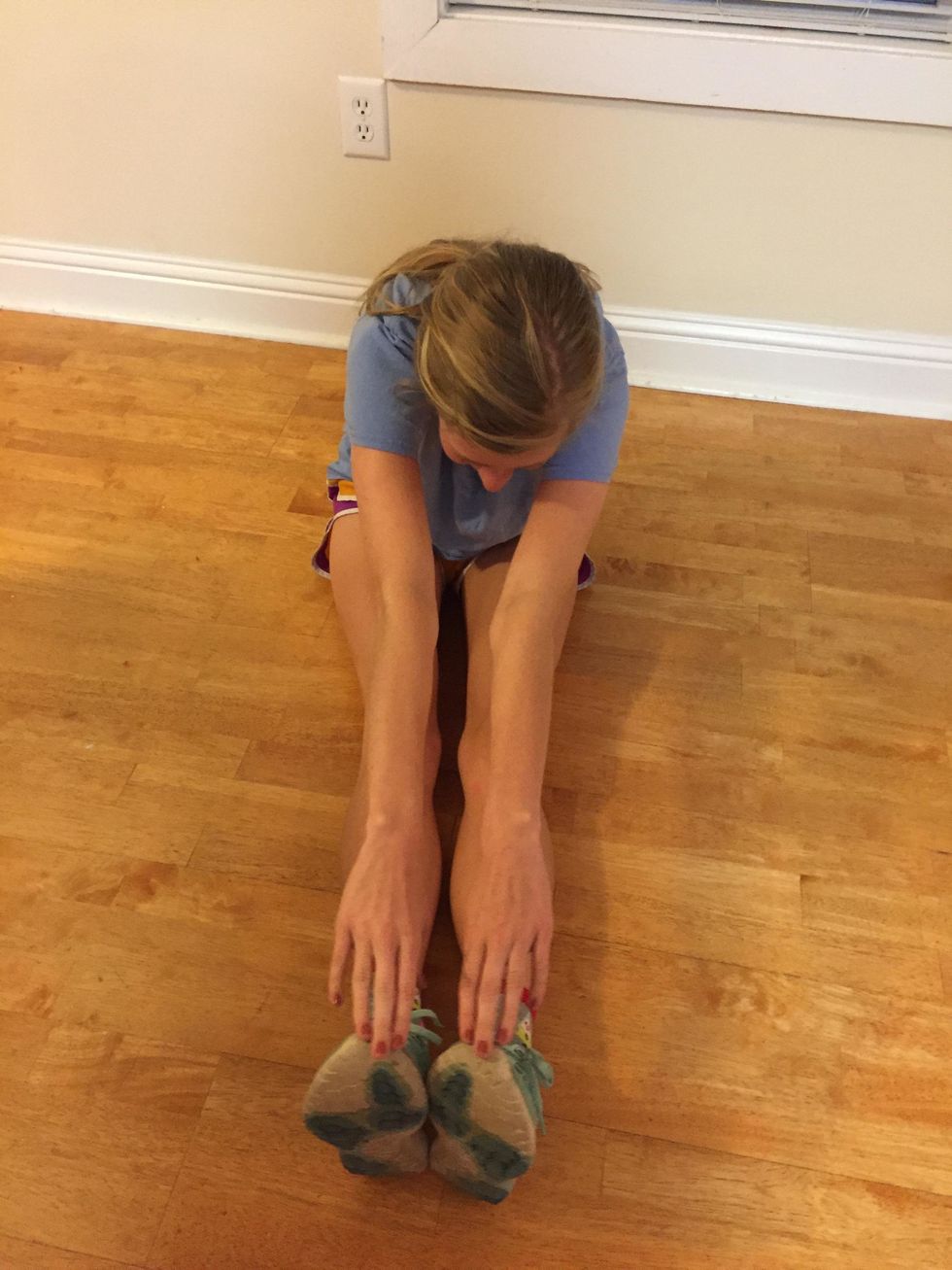 This stretches your hamstrings and calves.